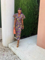 Loren - Vestido midi vibrante con mangas abullonadas