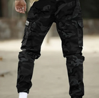 Pantalón utilitario resistente para hombre con múltiples bolsillos